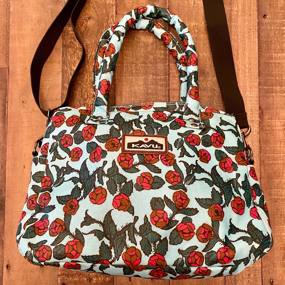 Kavu rose floral print handle bag with removable crossbody strap.